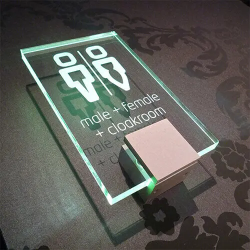 Illuminated ADA sign