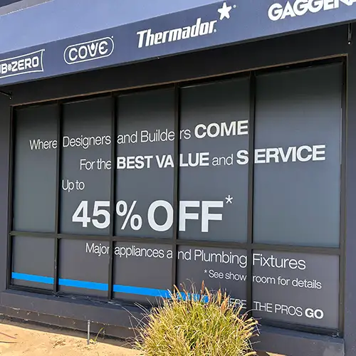 Professional window advertisement promoting-enhancing store visibility.